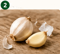 Step 2: Peel one fresh garlic clove. 